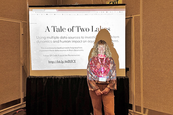 Jenny Edwards in front of a presentation