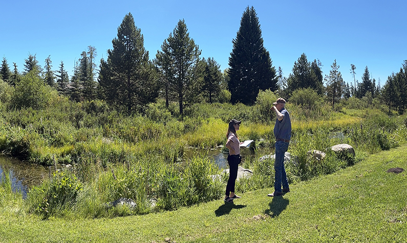 UW graduate student Pallavi Pokharel interviews Robert Lundy for her thesis. 