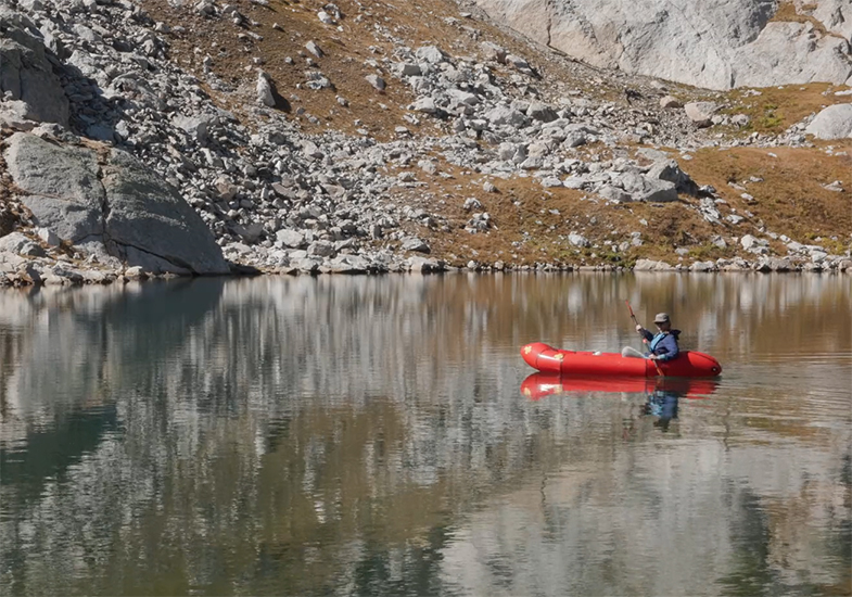 Meredith Journey in a canoe on an alpine lake