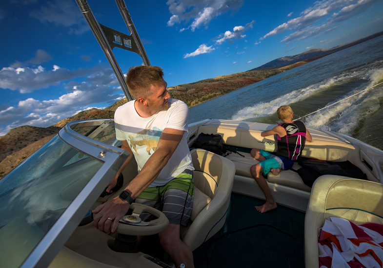 Father and son on a boat