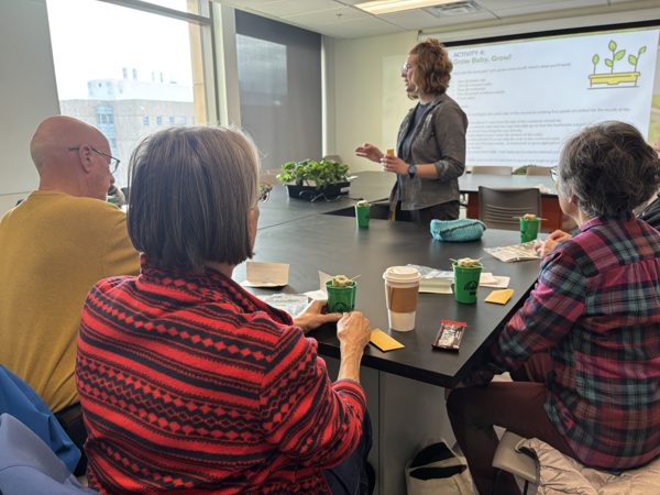 Researcher presenting to seniors
