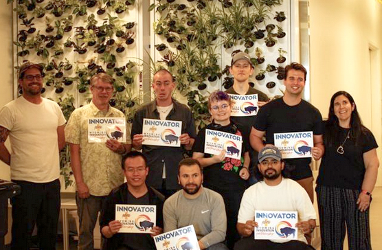 Group of people holding Innovation WIP certificates