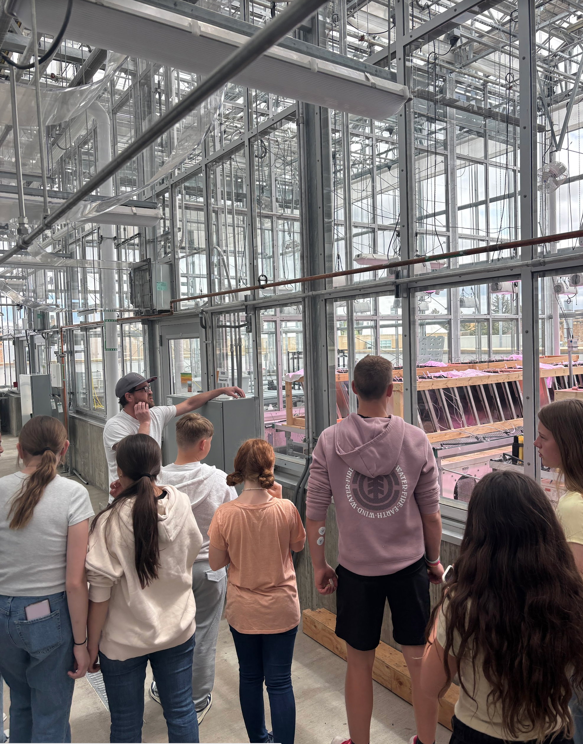 Students looking plant facility