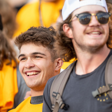 Two students looking across the distance at Saddle Up