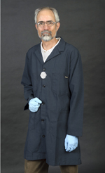 man wearing flame resistant/chemical protective lab coat