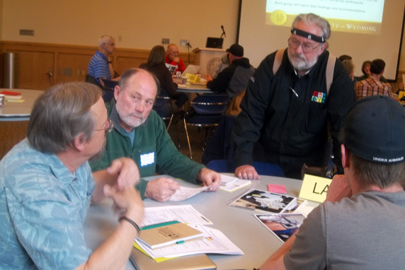People around a table at a Safety Coordinator Seminar