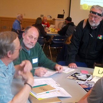 Smiling woman on campus lawn