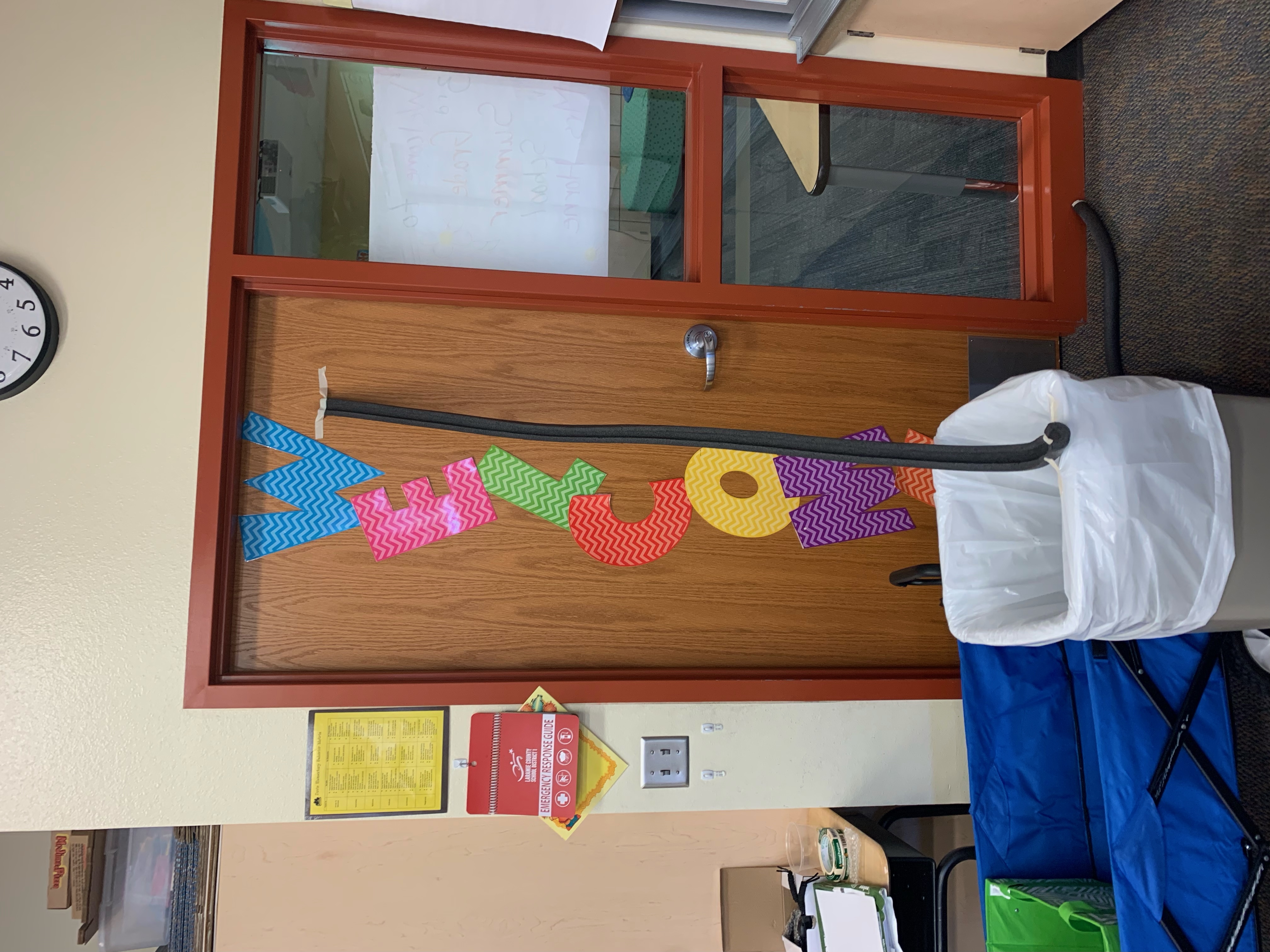 marble roller coaster taped against a door