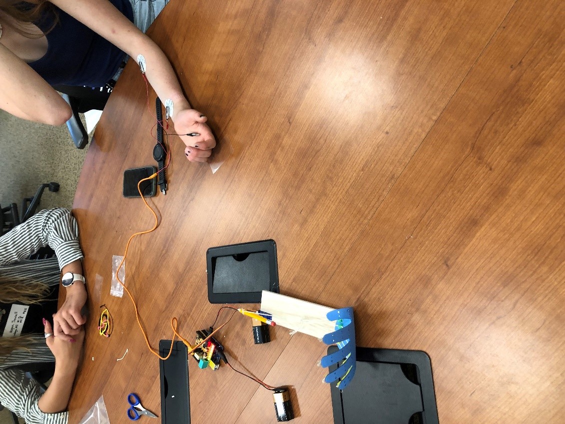 students testing a neuroprosthetic limb