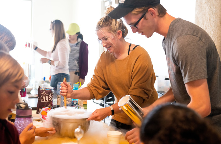 a group of people engaged in a STEM activity