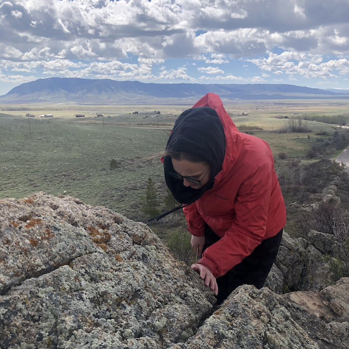 LAMP fellow observes lichen outside near Centennial