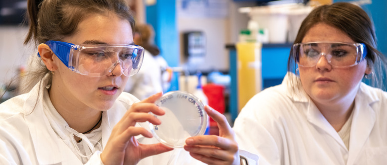 Student working in chemistry lab.