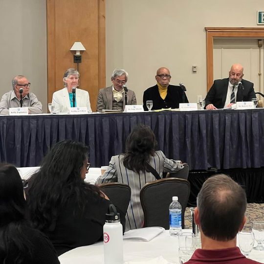 Dr. Fuji Adachi speaking on a panel with other ASPIRE legends at the 2023 Regional ASPIRE Conference in Park City, UT.