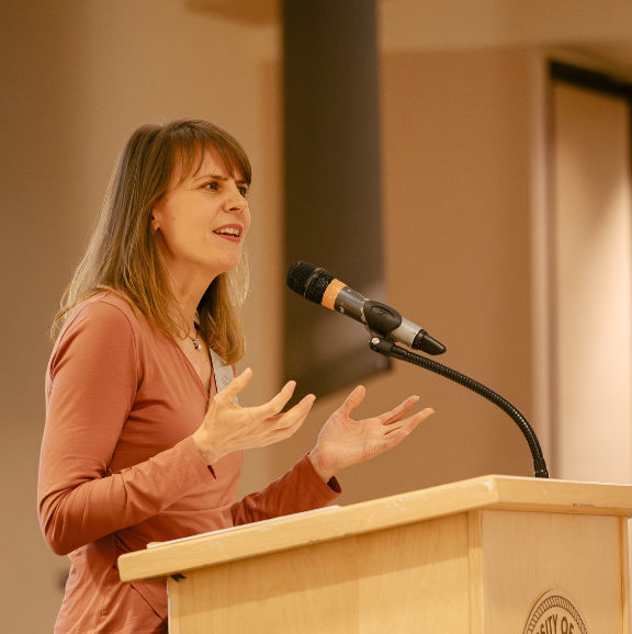 Image of first-generation student April Heaney speaking at the 2024 Student Recognition Dinner.