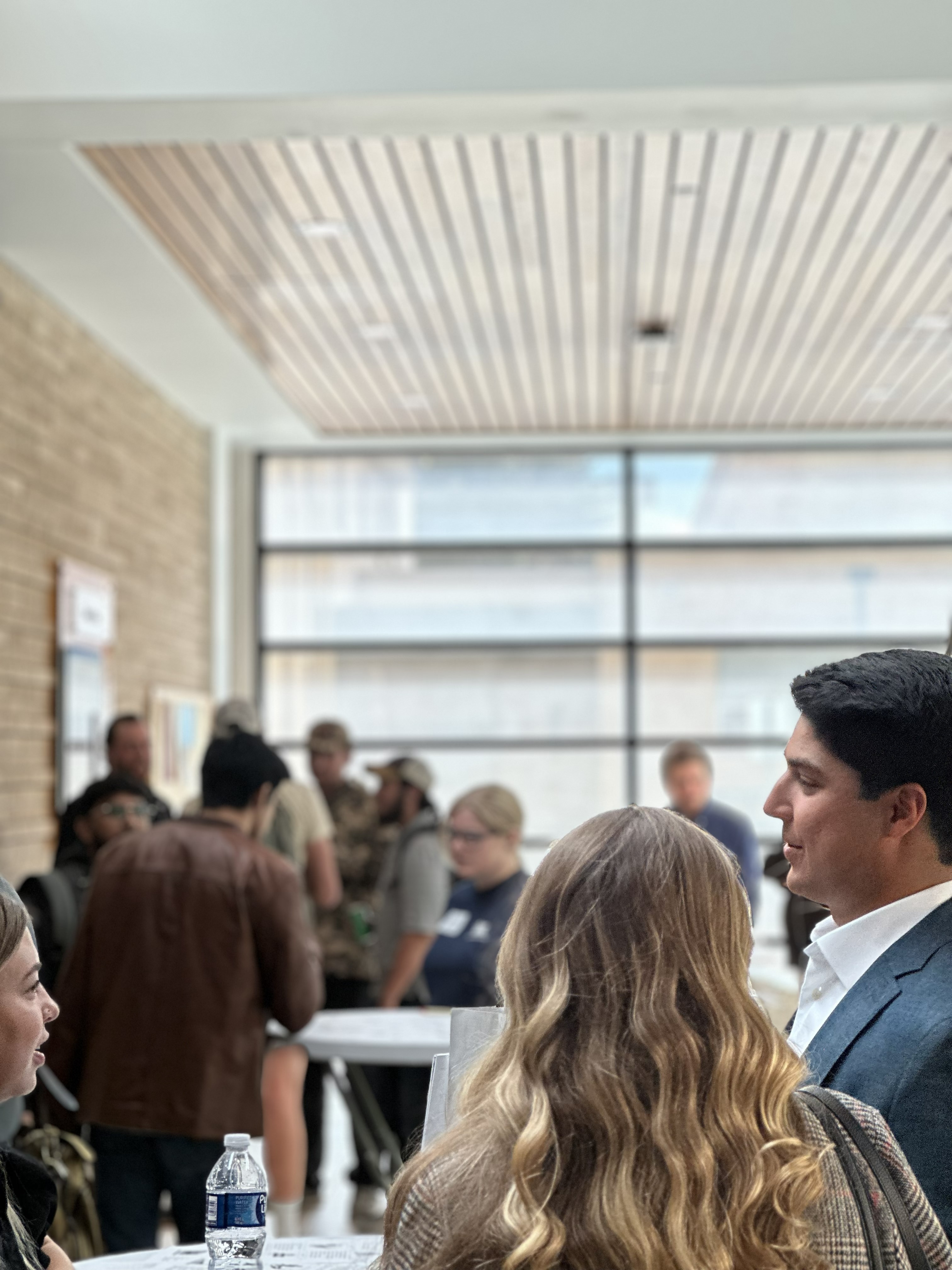 ser alum talking at a networking event in the energy innovation center