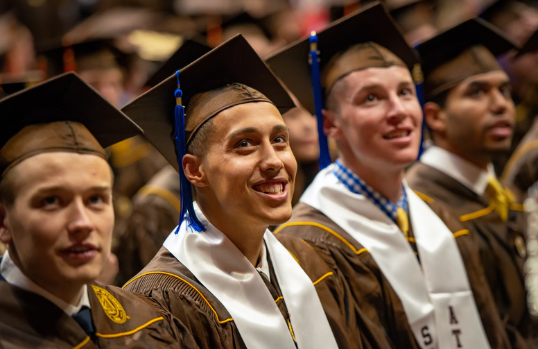 Students in graduation garb at commencement