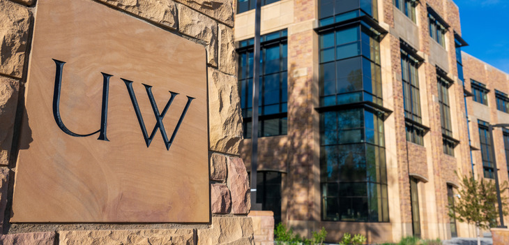 UW corner stone on a building