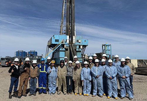 students visiting an oil rig