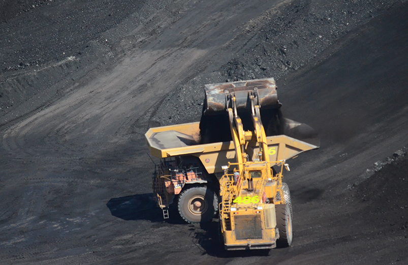 Giant haul truck being filled with coal in the Kemmerer Coal mine