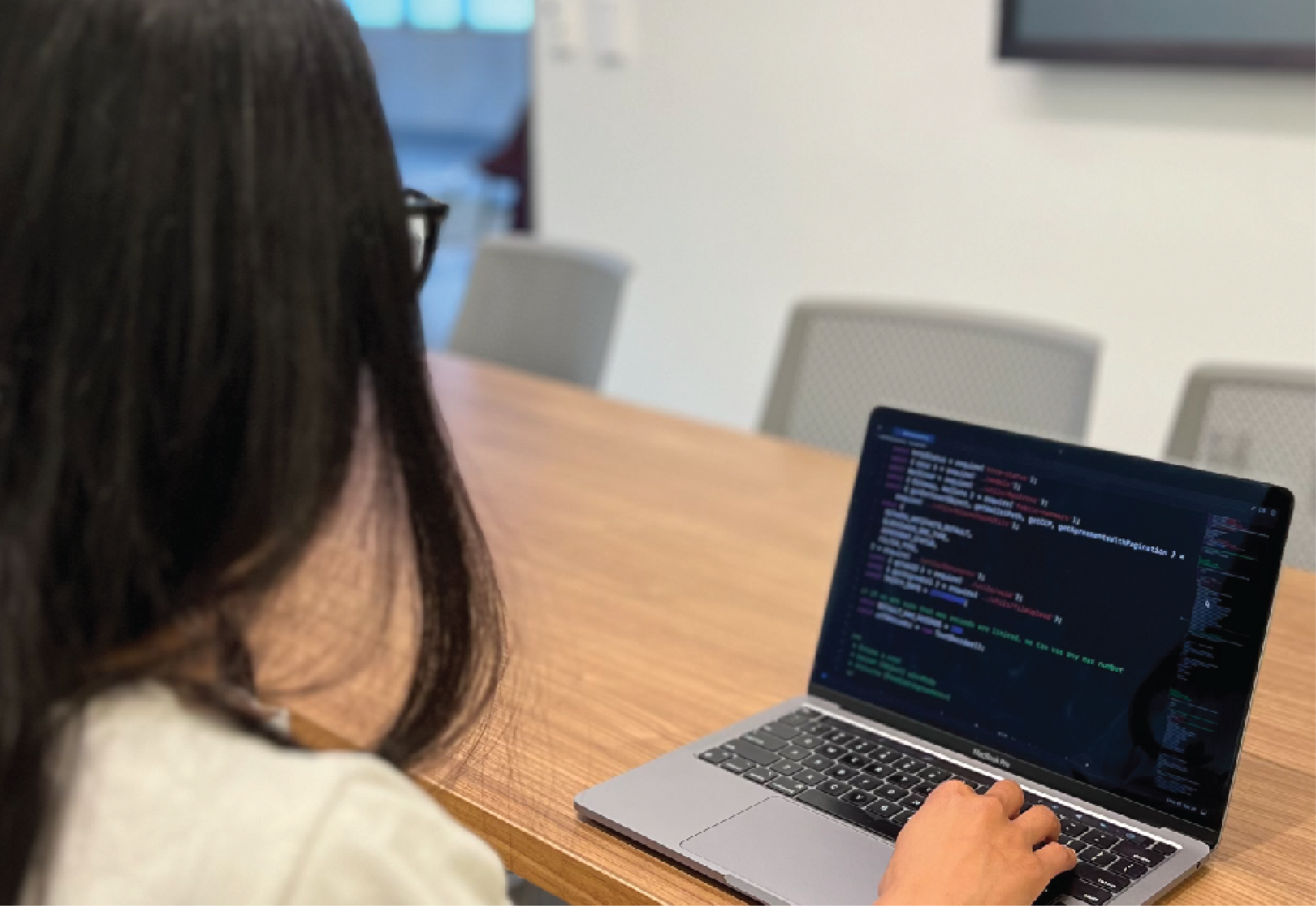 women working on a laptop
