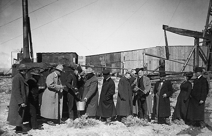 Workers at the Big Muddy Oil Field in Wyoming
