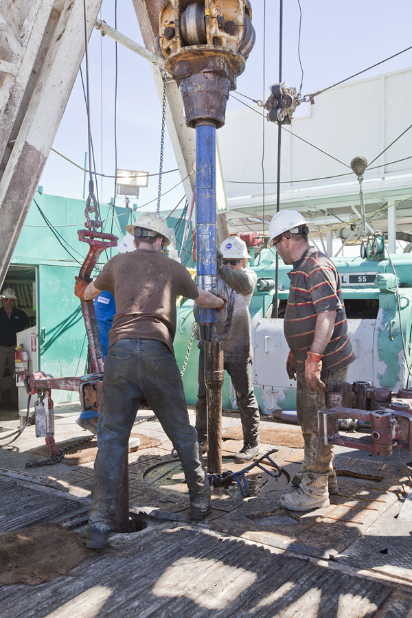 3 men drilling
