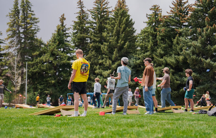 Students playing cornhole at a Union Fest event.