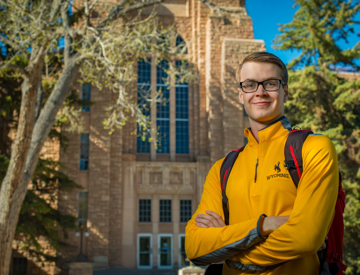 Student standing outside the College of Engineering