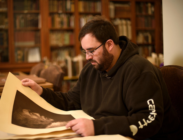 A student studies in the American Heritage Center.