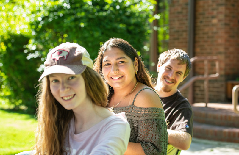 A group of UW students gather outside the Honors House.