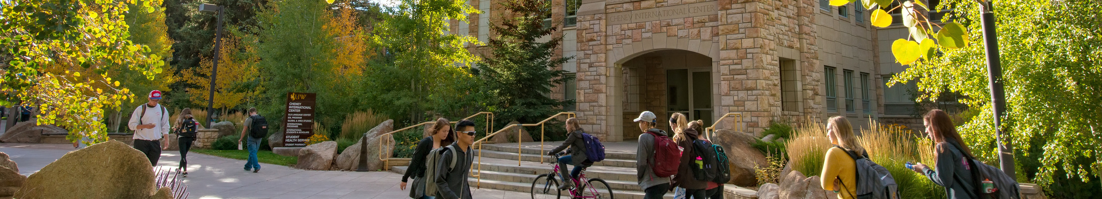 students walking past the Student Health Service building