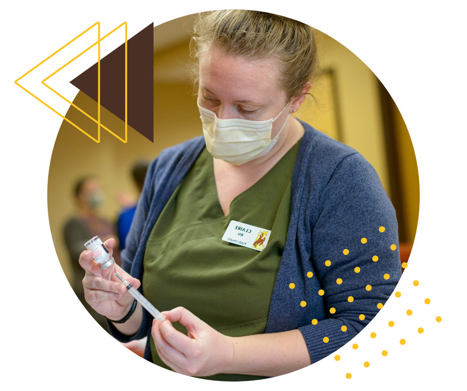 nurse administering a vaccine