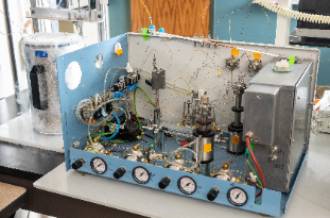 A Gas Bench unit, that used glass capilaries, steel connections,  and a heated column to seperate gases, to measure Carbon and Oxygen Isotope Rations