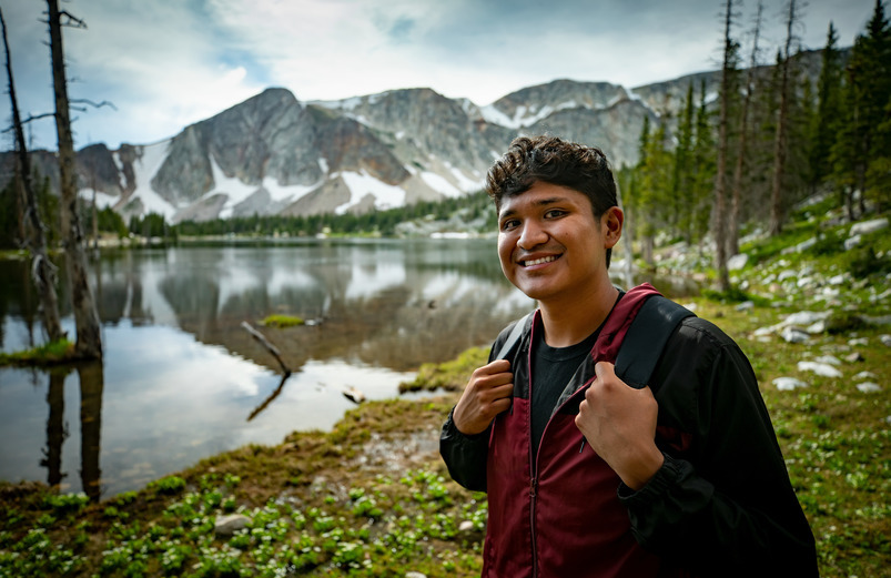 student outside on a hike