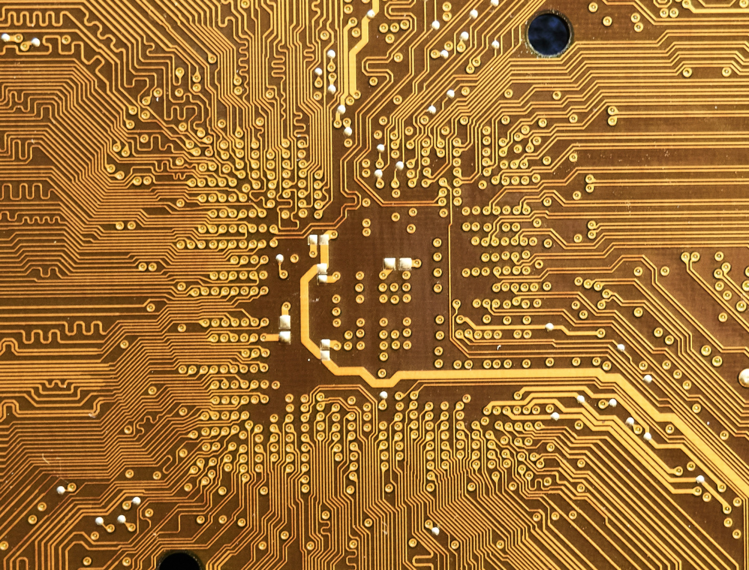 A close up of a computer chip's cricut board.