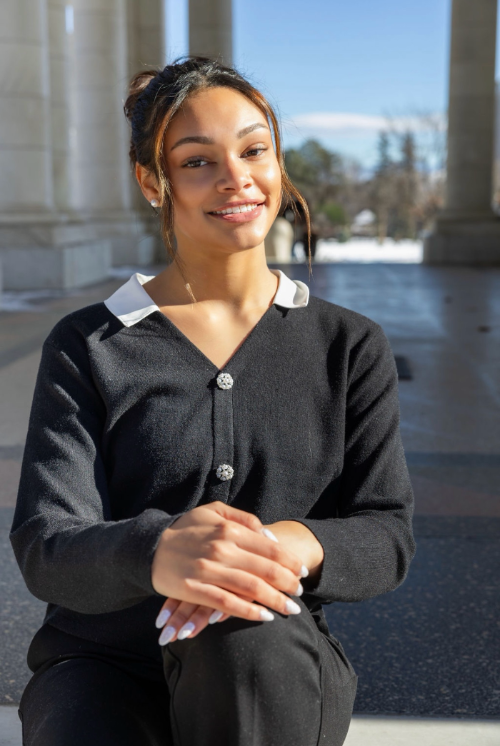 Smiling woman wearing a black top