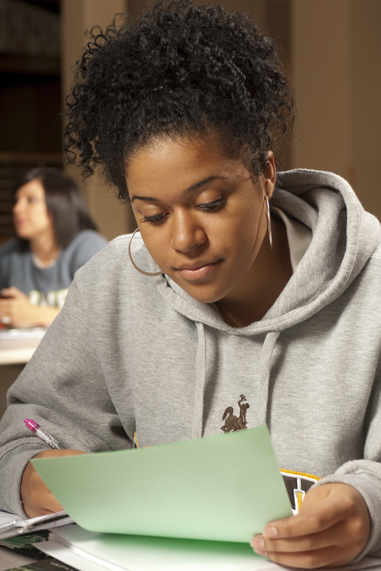 Woman reading a paper