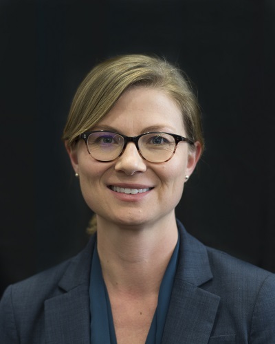 Zoe Pearson in front of a black background