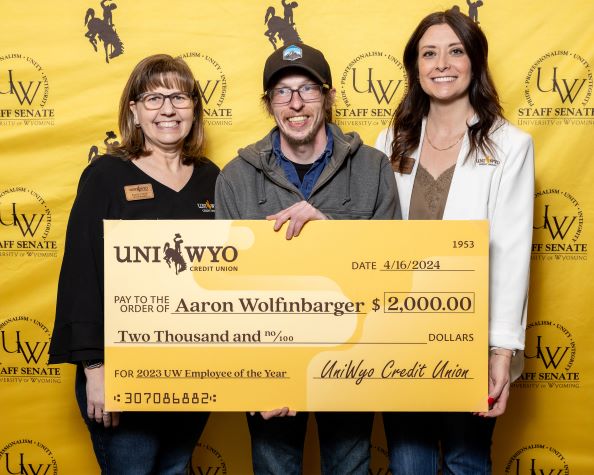 Employee of the Year Wolfinbarger presented with large check from UniWyo Credit Union