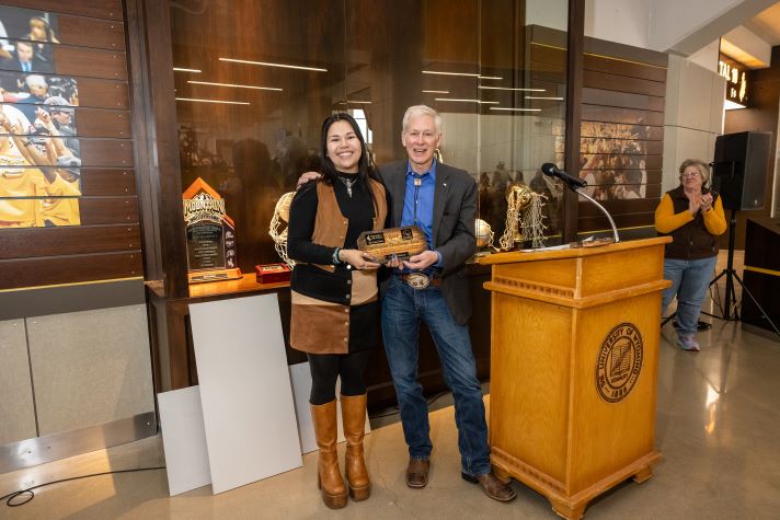 Presidental Excellence Awardee Wildcat and President Seidel