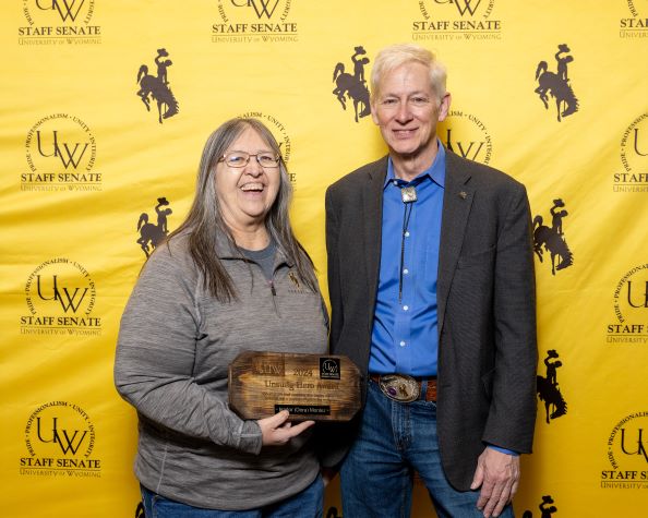 Unsung Hero Awardee Montez and President Seidel