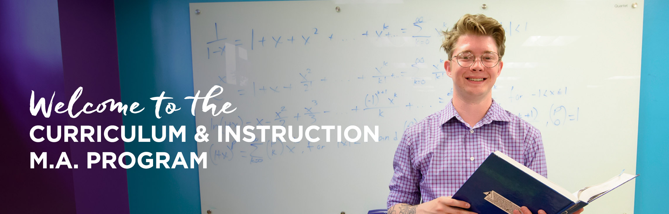 A uwyo curriculum and instruction M.A. student in front of a whiteboard with equations