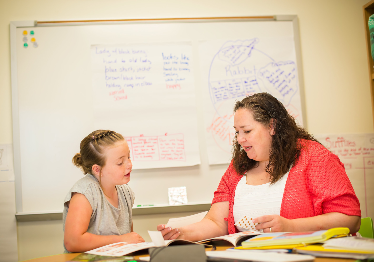 College of Education Faculty Member Stella Nowell with elementary student.