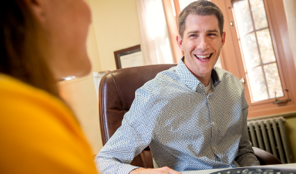 Advisor helping student in his office