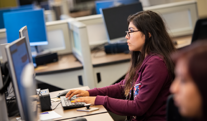 Student working on computer in computer lab