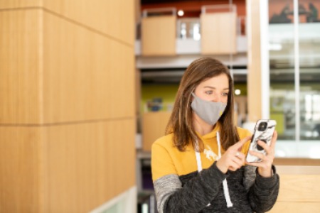 Student looking at phone