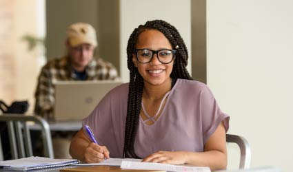 Student in Book and Bean