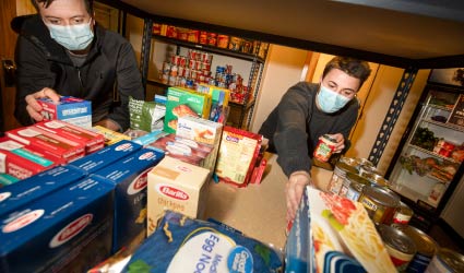 Students in food share pantry