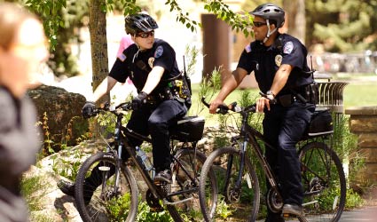 Cops riding bikes on campus