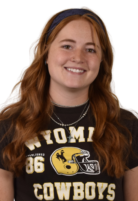 Cowboy Coach Autumn Groth poses for a photo